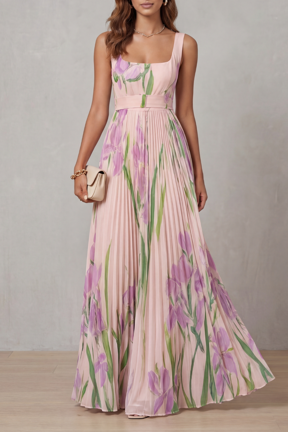 Woman wearing a pink floral dress against a neutral background